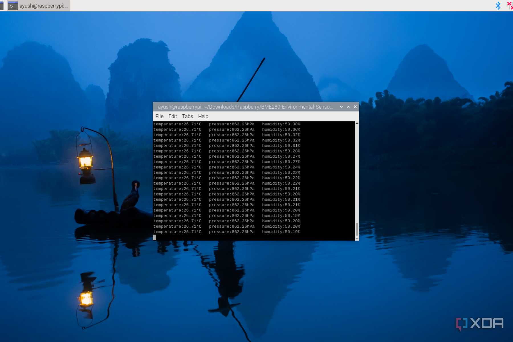 The Raspberry Pi terminal depicting the temperature, pressure, and humidity values generated by the BME280 sensor