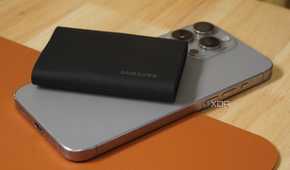 A Samsung T9 Portable SSD on an iPhone 15 Pro Max.