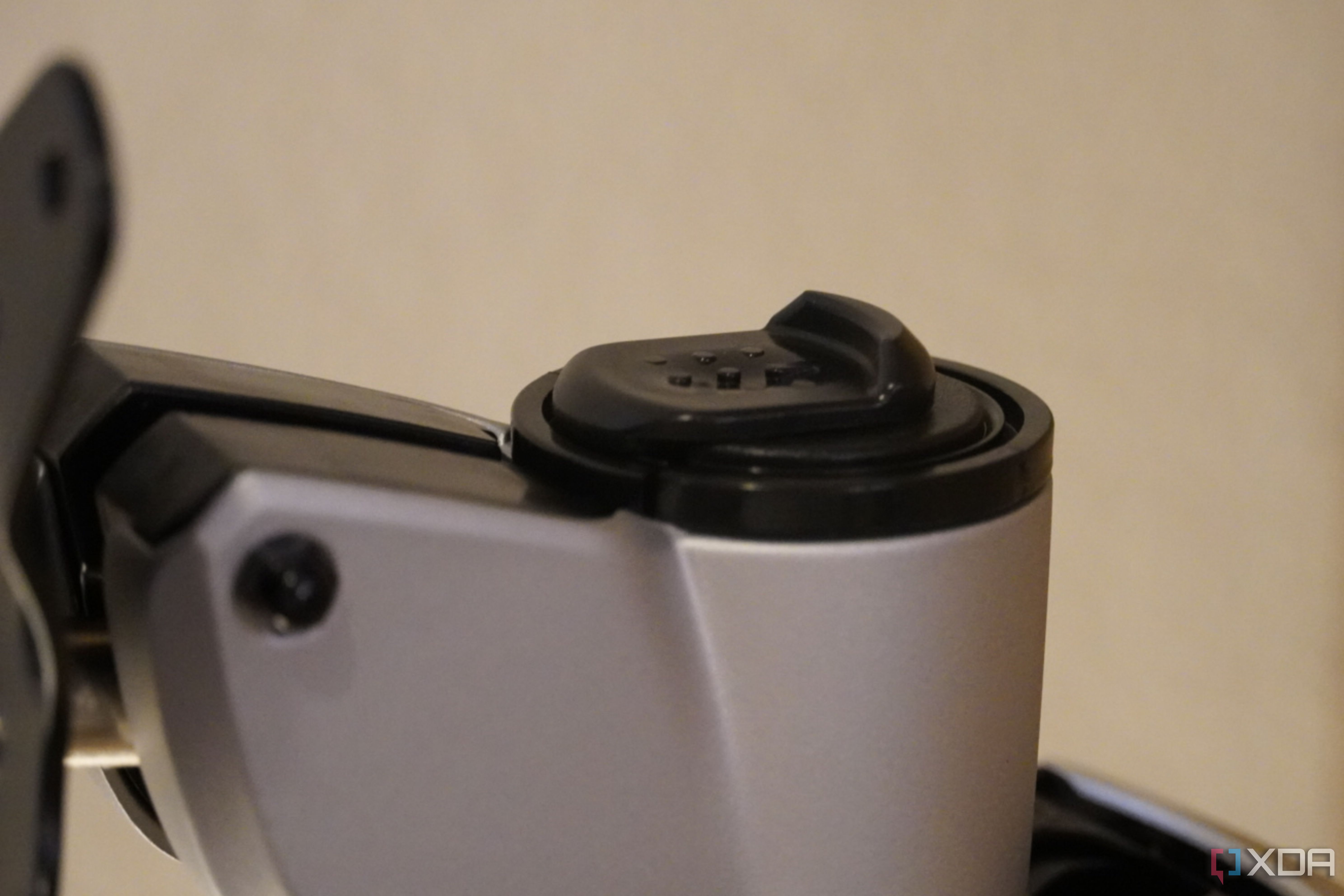 The auto-locking clip on a StarTech monitor arm.