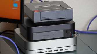 The Ugreen NAS sandwiched between an Ayaneo Mini PC and Mac Mini.