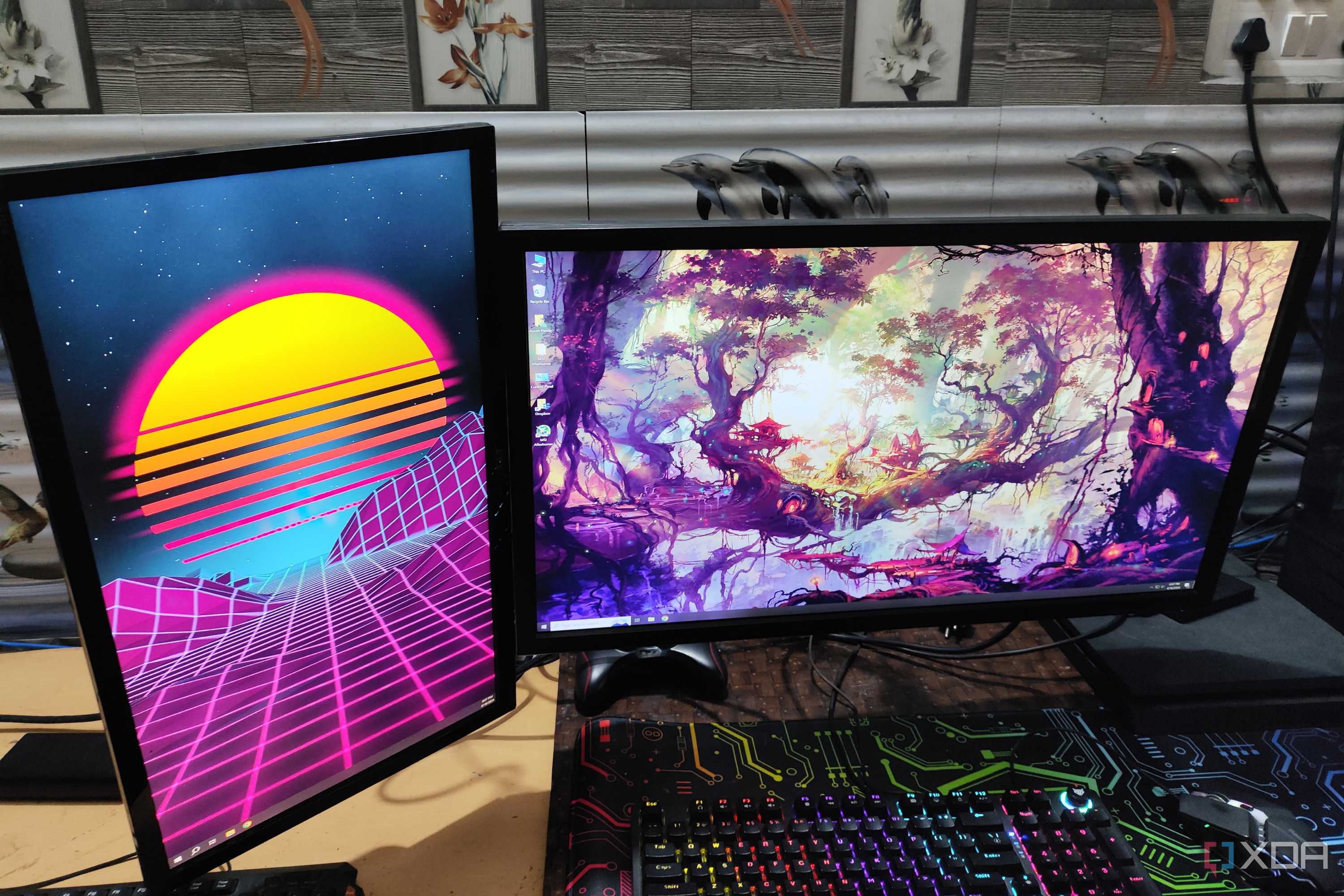 A normal monitor and a vertical monitor mounted on the same monitor arm