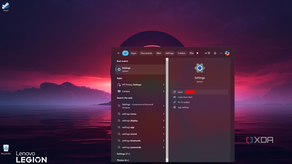 The Windows search function, with an arrow pointing at the Settings icon