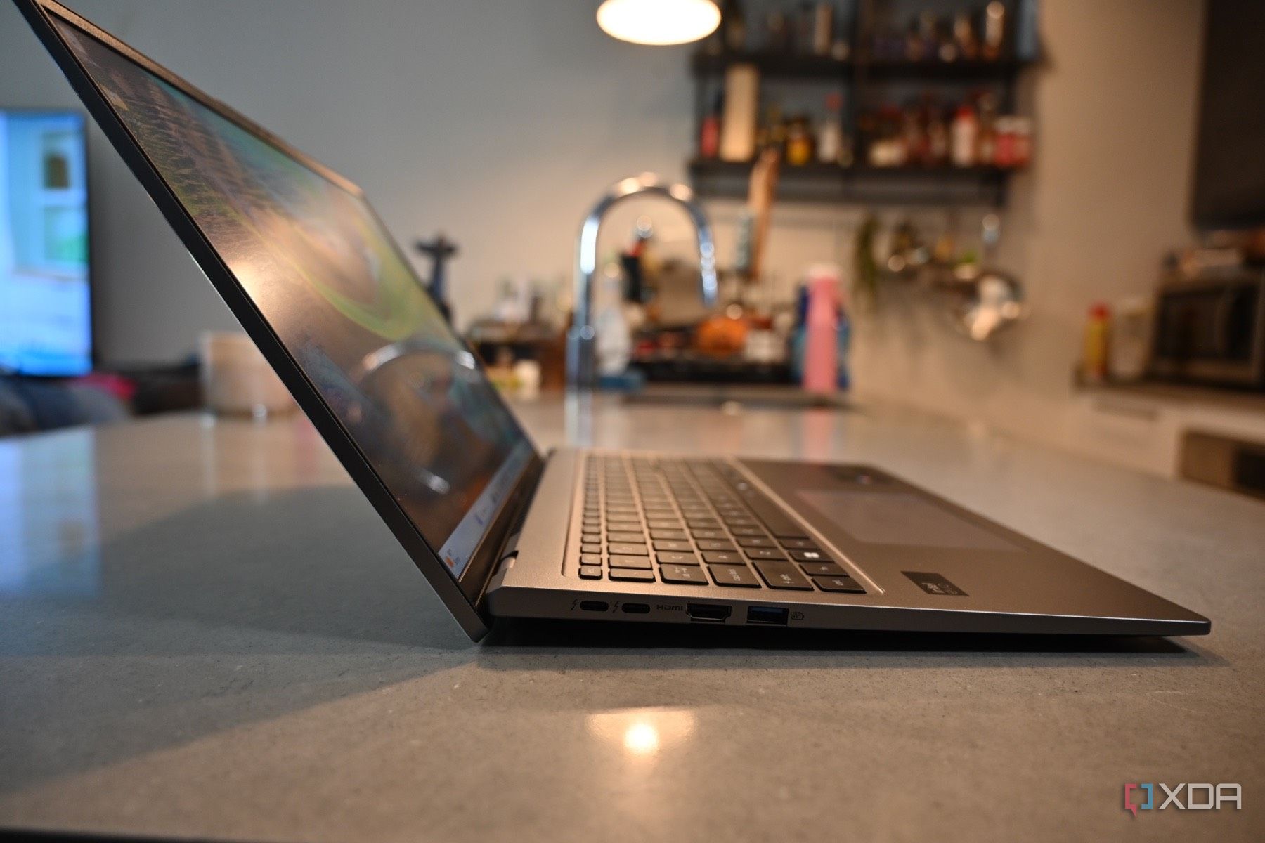 Side shot of Acer Swift Go 14 (2024) with slightly raised keyboard