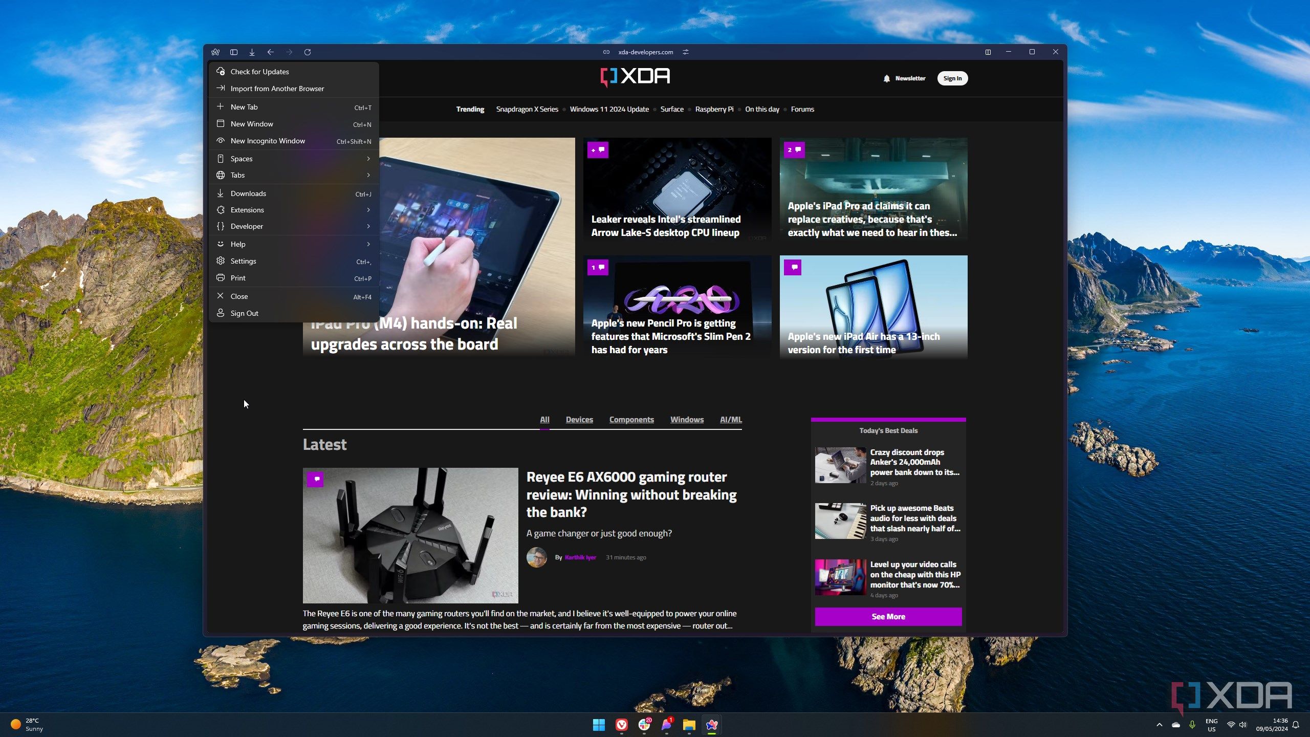 Screenshot of the XDA homepage open in Arc with the browser menu open