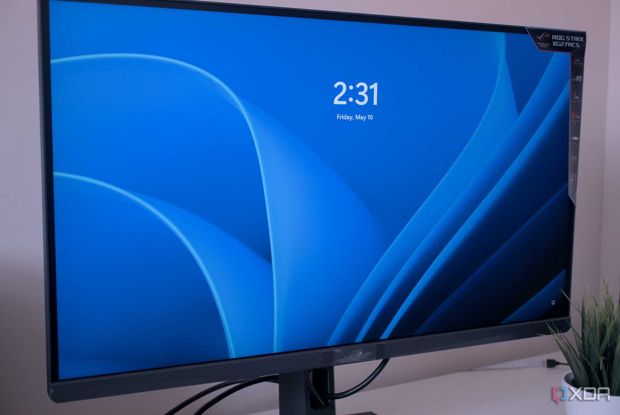 Side view of the Asus ROG Strix XG27ACS Windows login screen