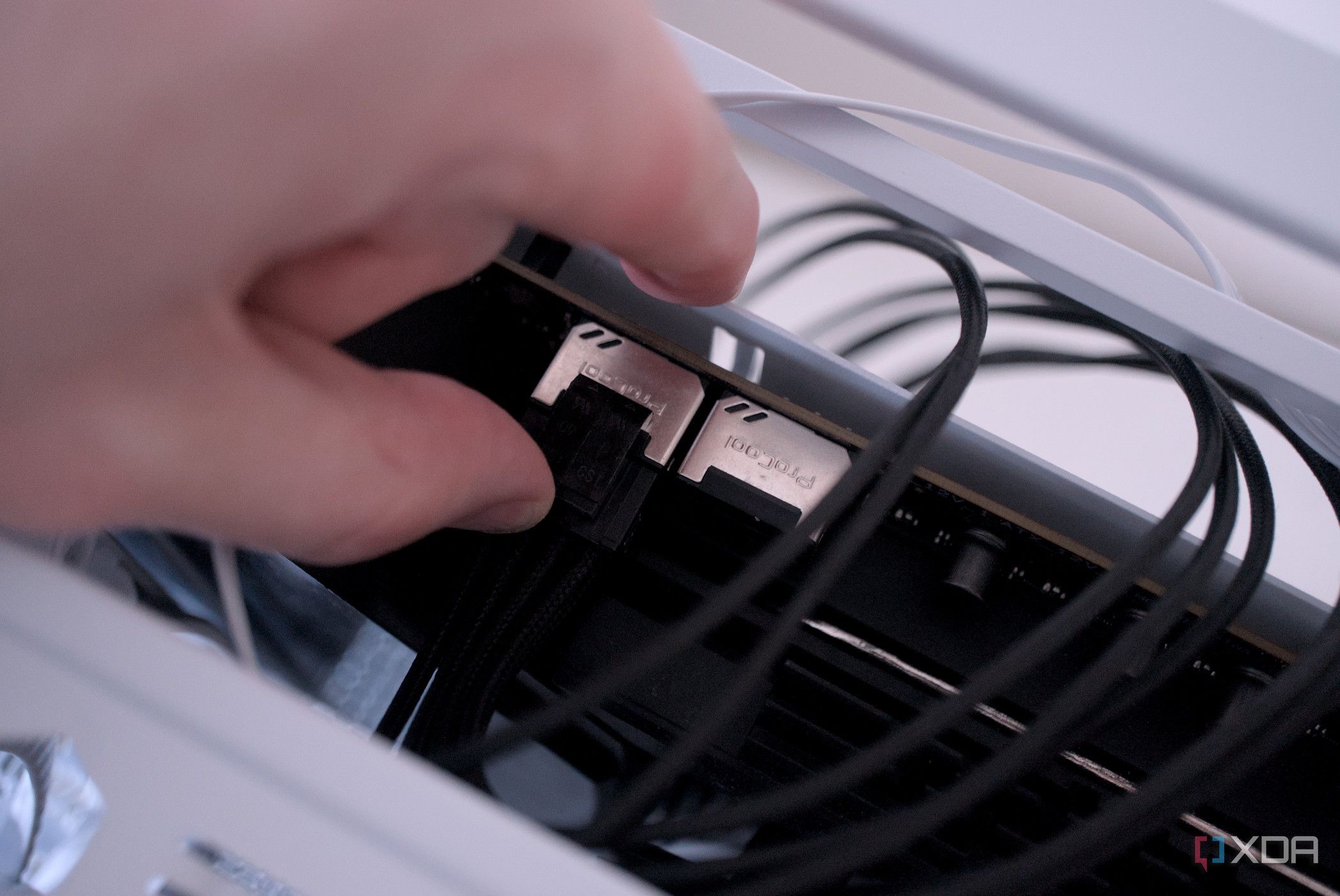 Attaching the CPU power cables inside the be quiet! Dark Base 701