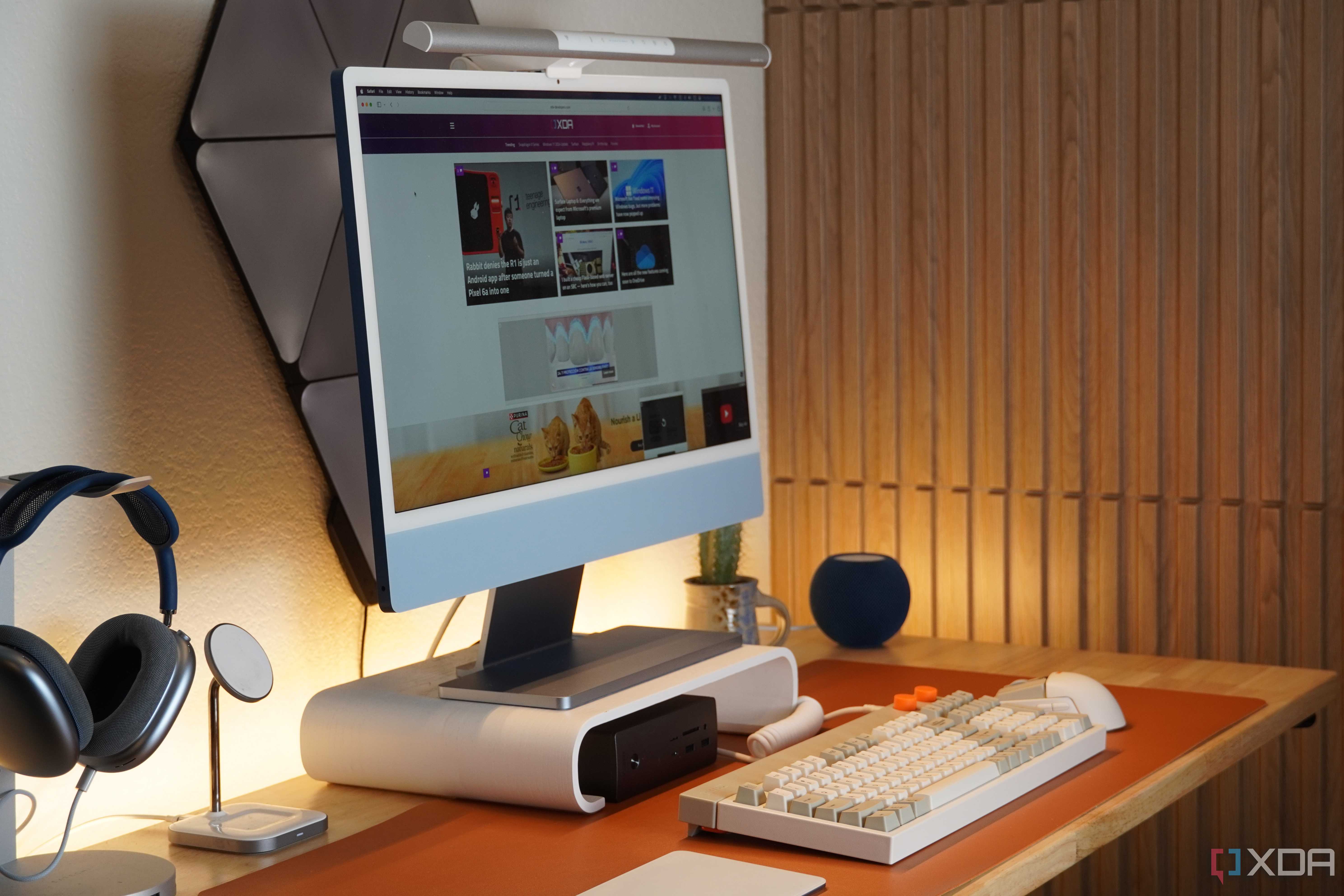 A desk setup featuring the BenQ ScreenBar Pro.