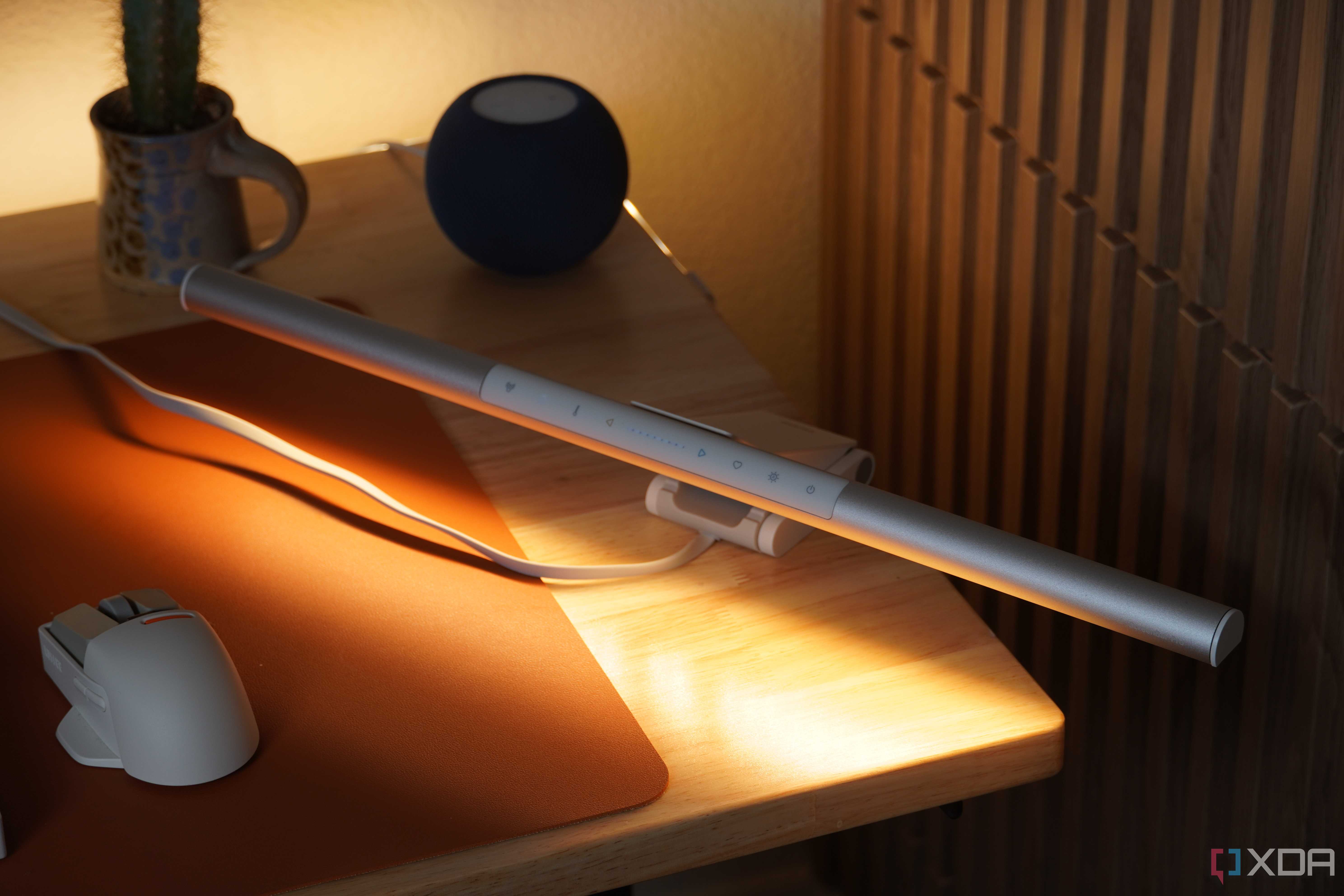 The BenQ ScreenBar Pro on a desk.