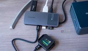 A Cabletime 10-in-1 8K USB-C Hub Digital Display with an external SSD connected indicating that speeds are limited to USB 2.0