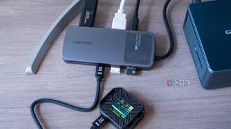 A Cabletime 10-in-1 8K USB-C Hub Digital Display with an external SSD connected indicating that speeds are limited to USB 2.0