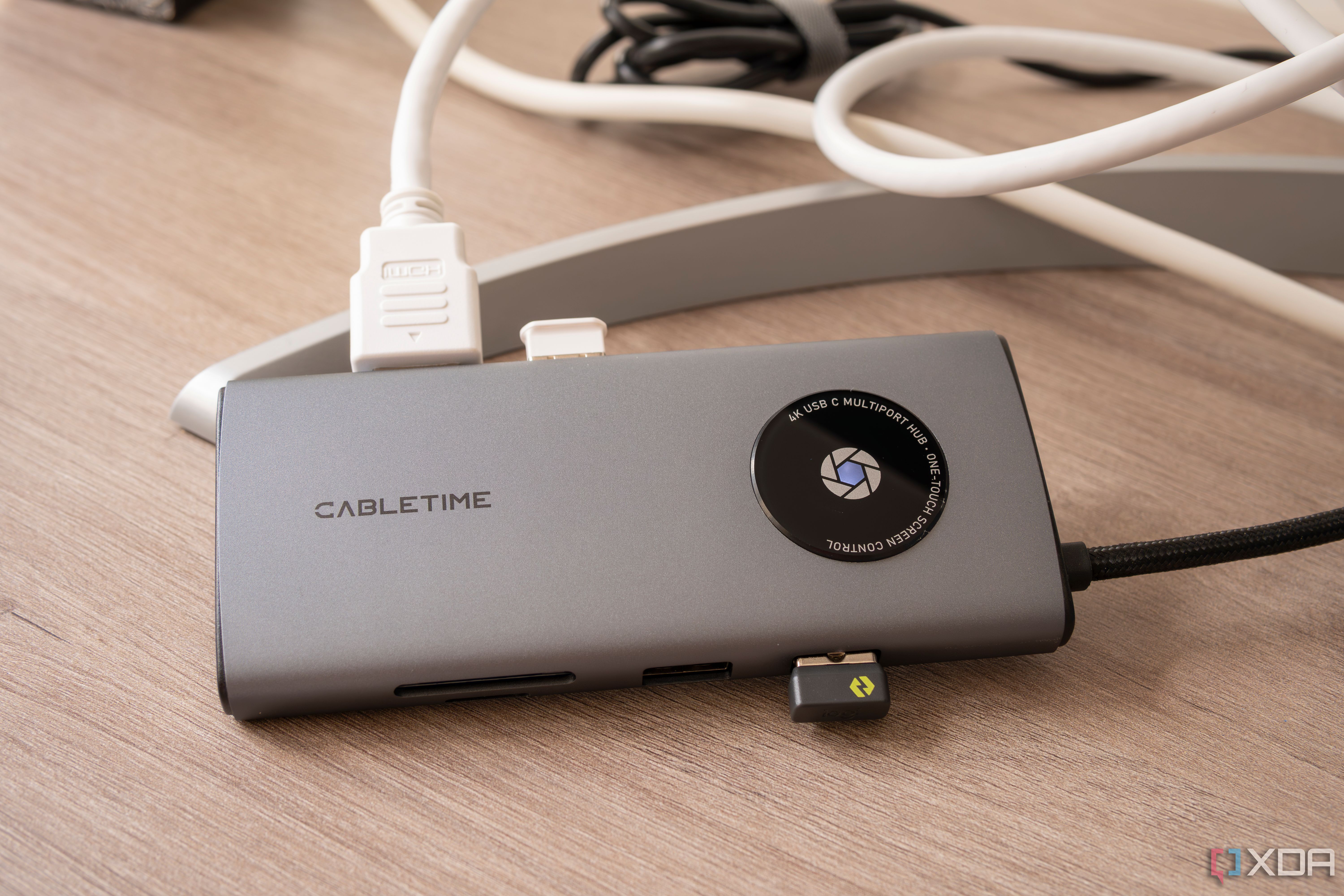A Cabletime USB-C hub with a white light indicating display output is enabled