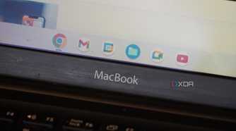 The ChromeOS dock above the MacBook text.