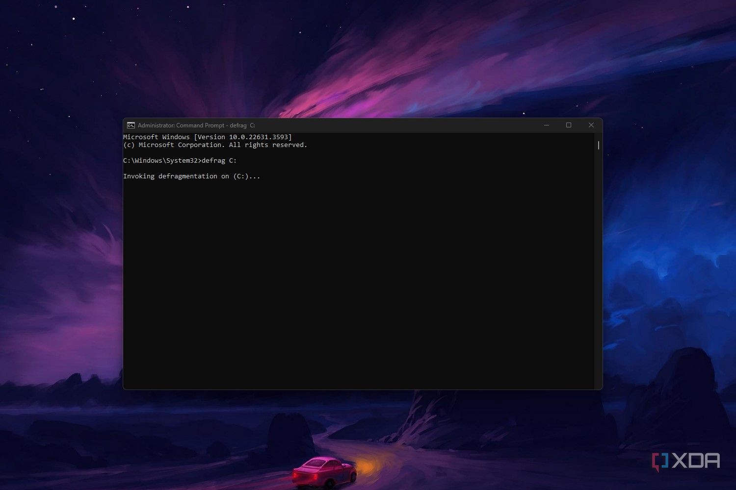 Windows 11 command prompt screenshot that shows the defrag command in action