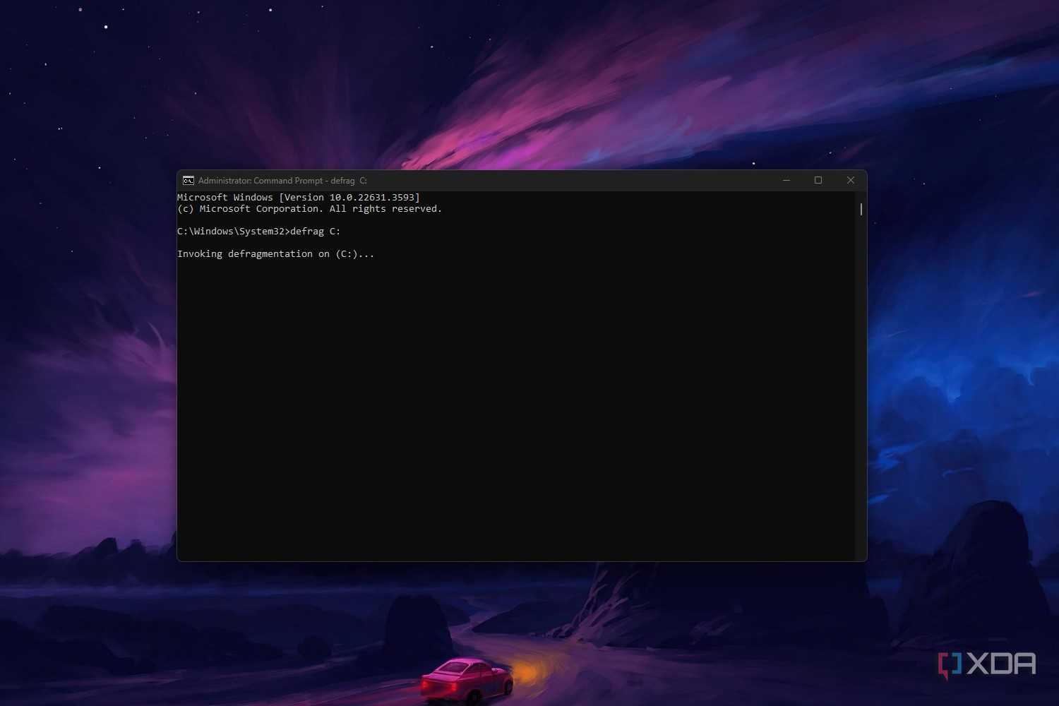 Windows 11 command prompt screenshot that shows the defrag command in action