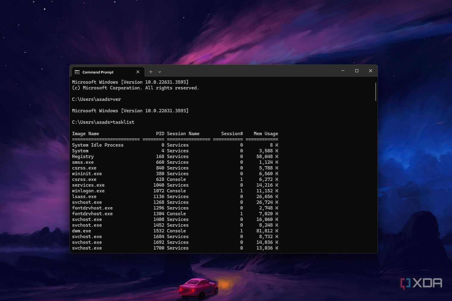 Windows 11 command prompt screenshot that shows the tasklist command in action