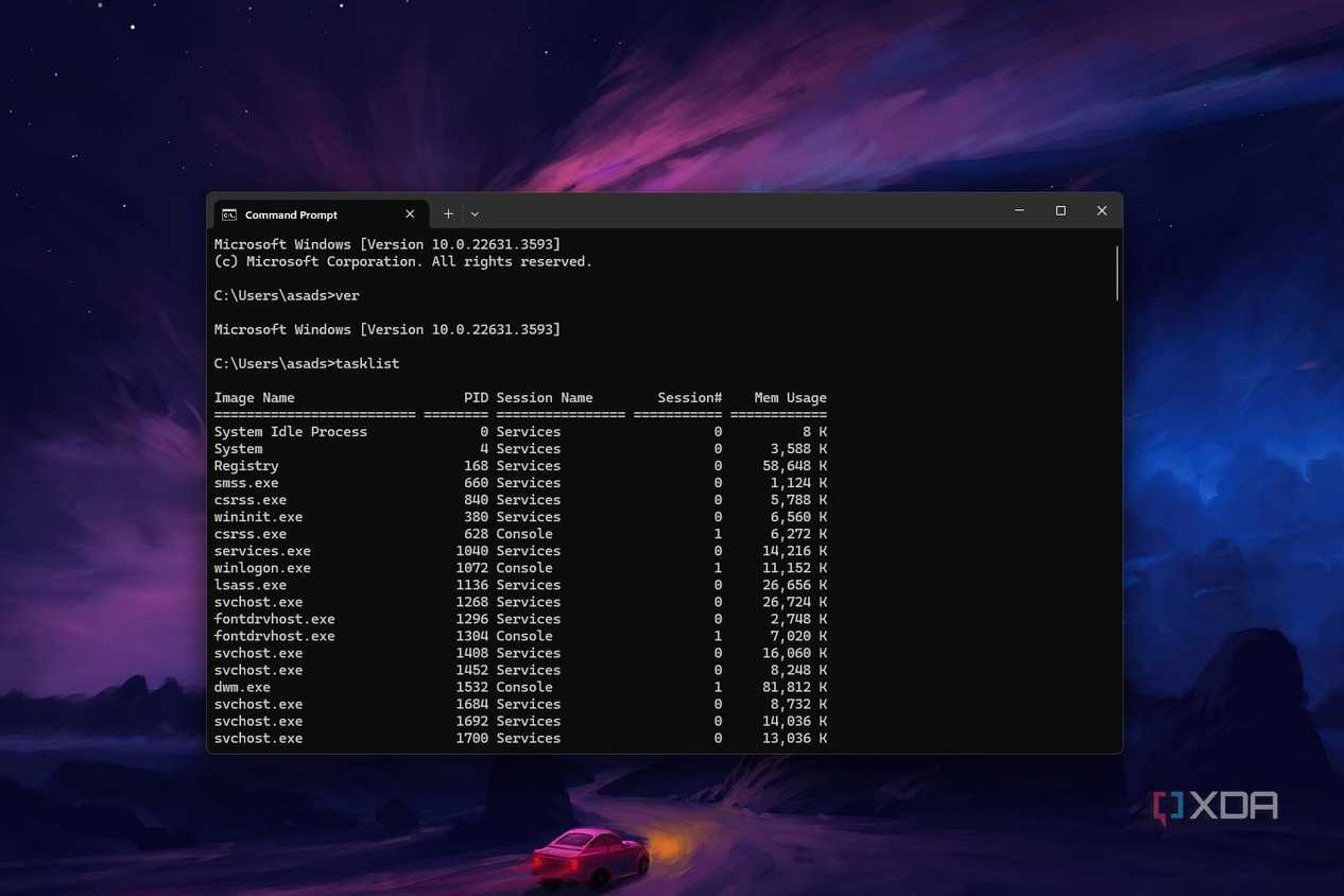 Windows 11 command prompt screenshot that shows the tasklist command in action