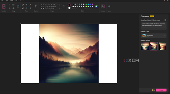 Screenshot of Paint after generating an image using Cocreator. The prompt used is "a lake in the middle of a forest at sunrise with mountains in the background" and it's using the digital art style