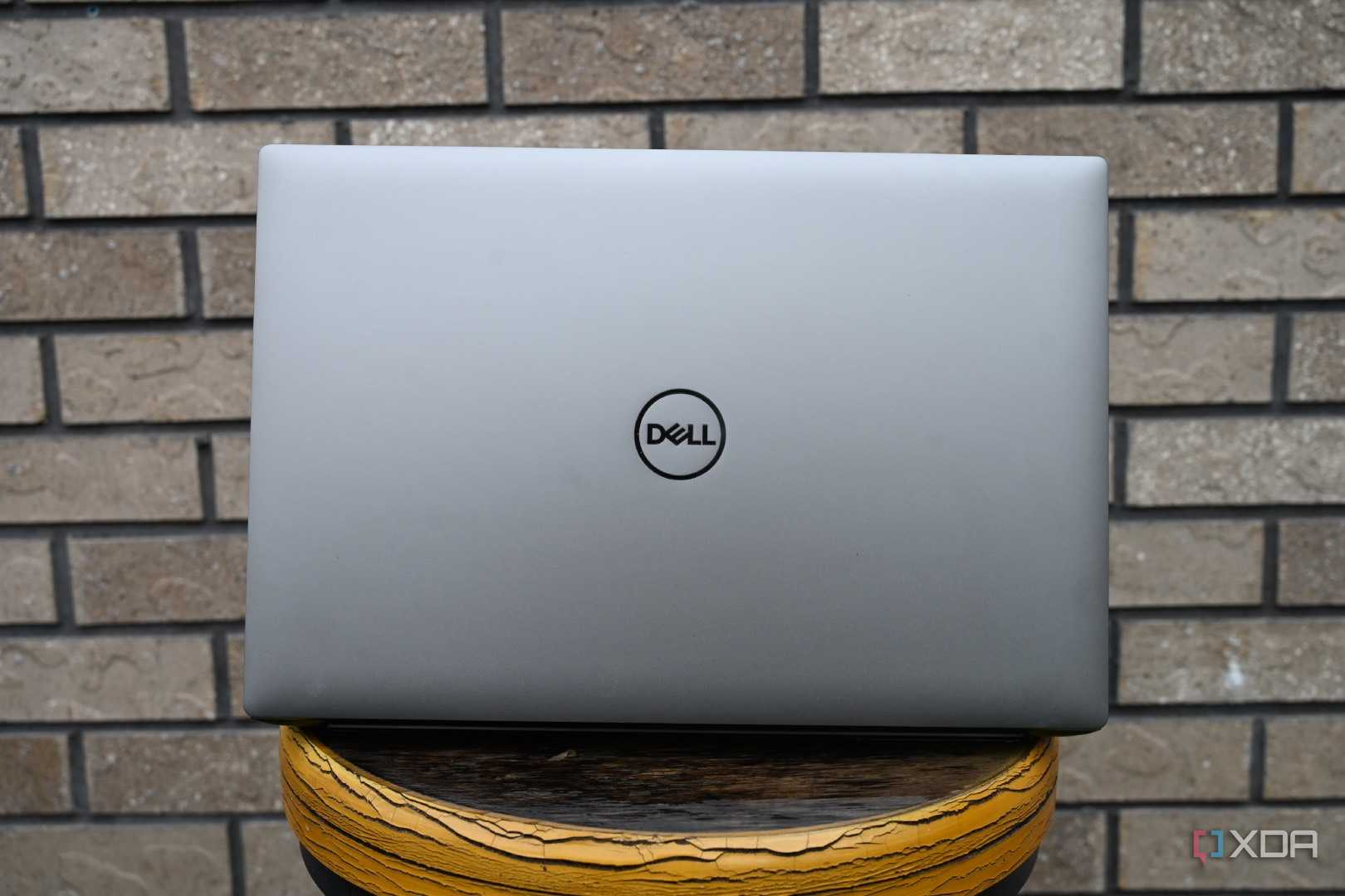 Dell Precision 5690 lid against brick wall