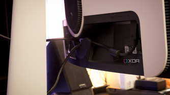 The rear cable holder of the Dell AW3225QF.