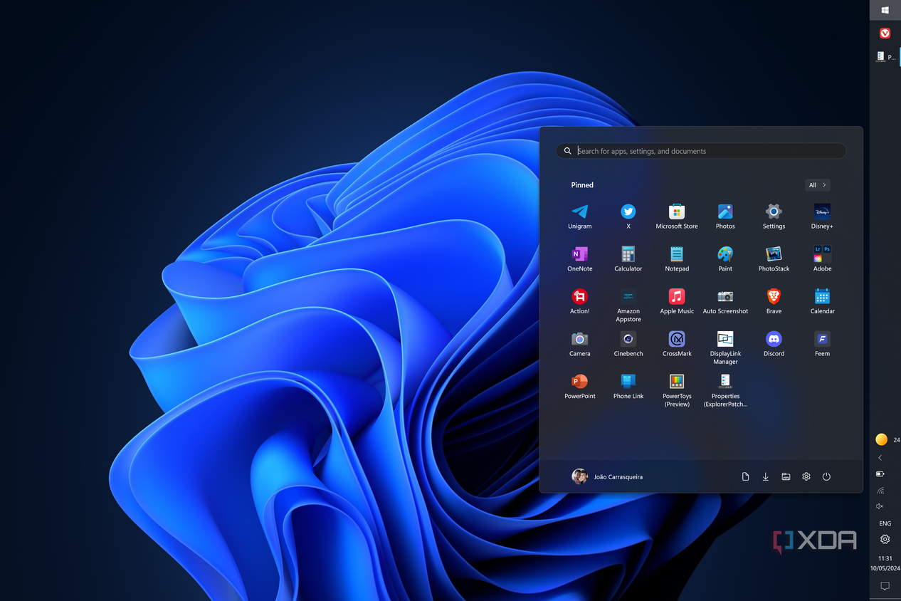 Screenshot of a Windows 11 desktop with a taskbar on the right side of the screen with a Start menu without Recommended content