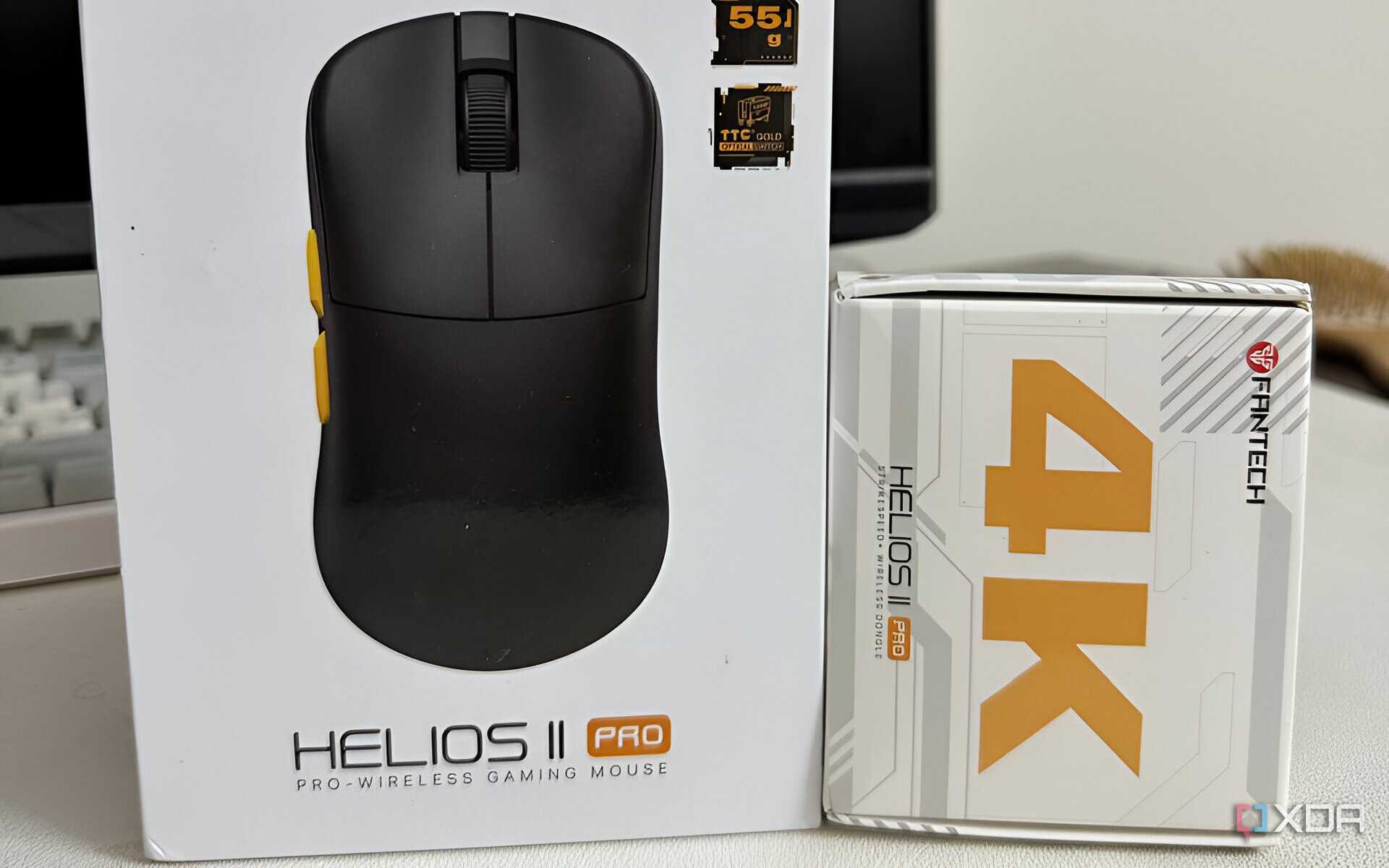 A picture of the Fantech Helios II Pro box and the 4K dongle box.