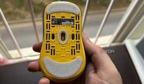 A product shot of the Fantech Helios II Pro Wireless mouse flipped upside down.
