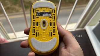 A product shot of the Fantech Helios II Pro Wireless mouse flipped upside down.