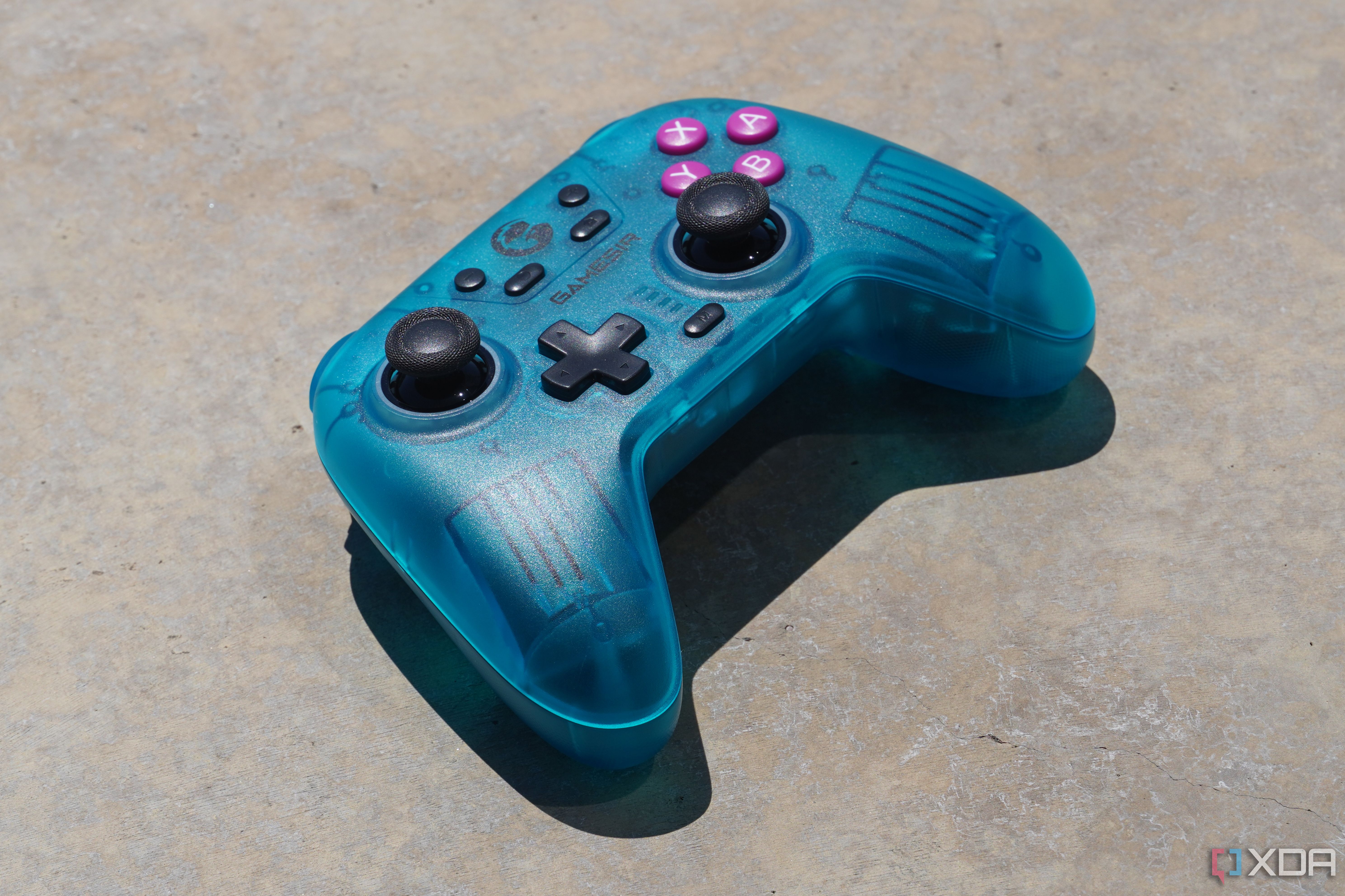 An angled view of the GameSir Nova on concrete.