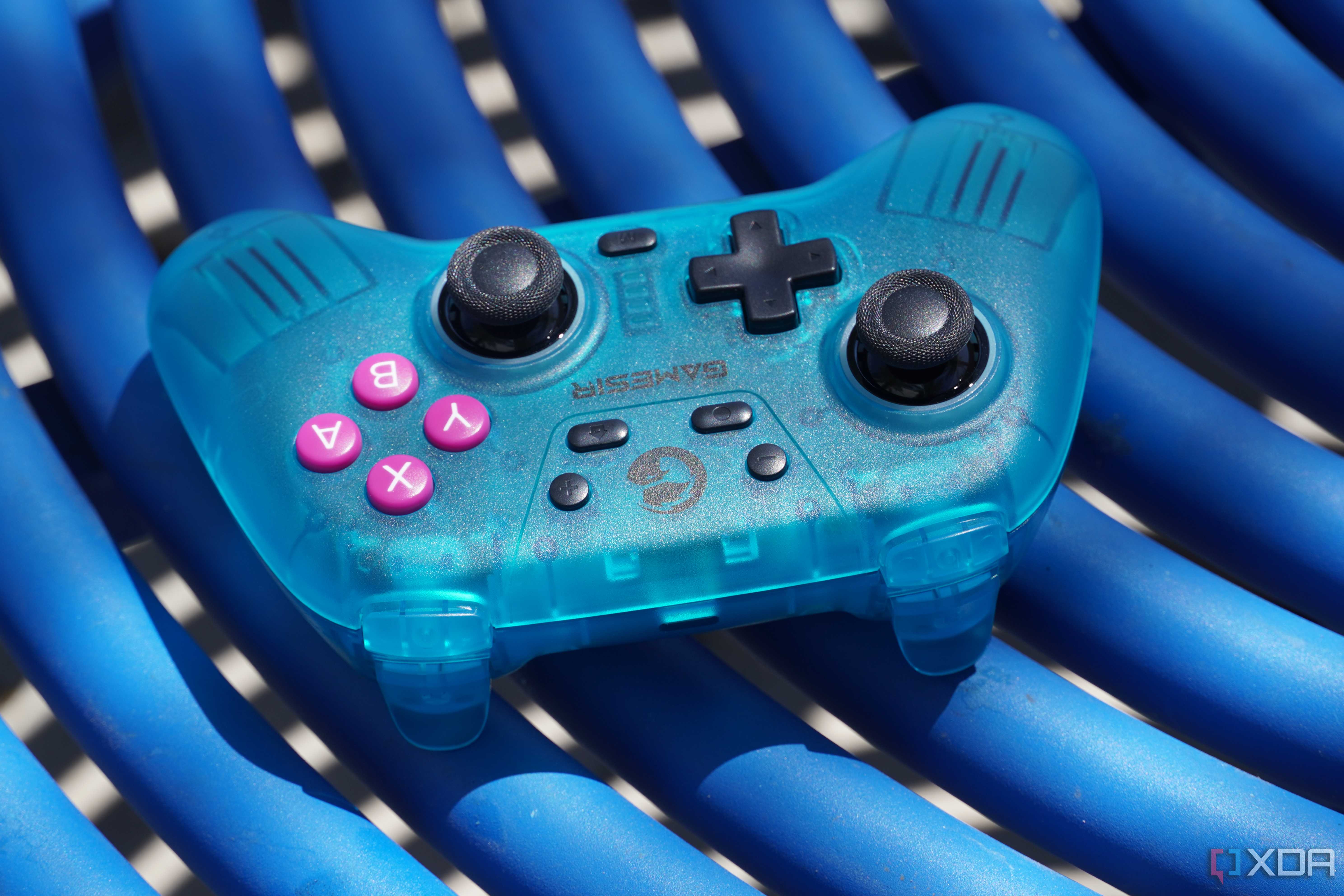 The GameSir Nova on a blue table.