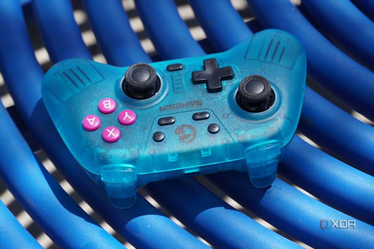 The GameSir Nova on a blue table.