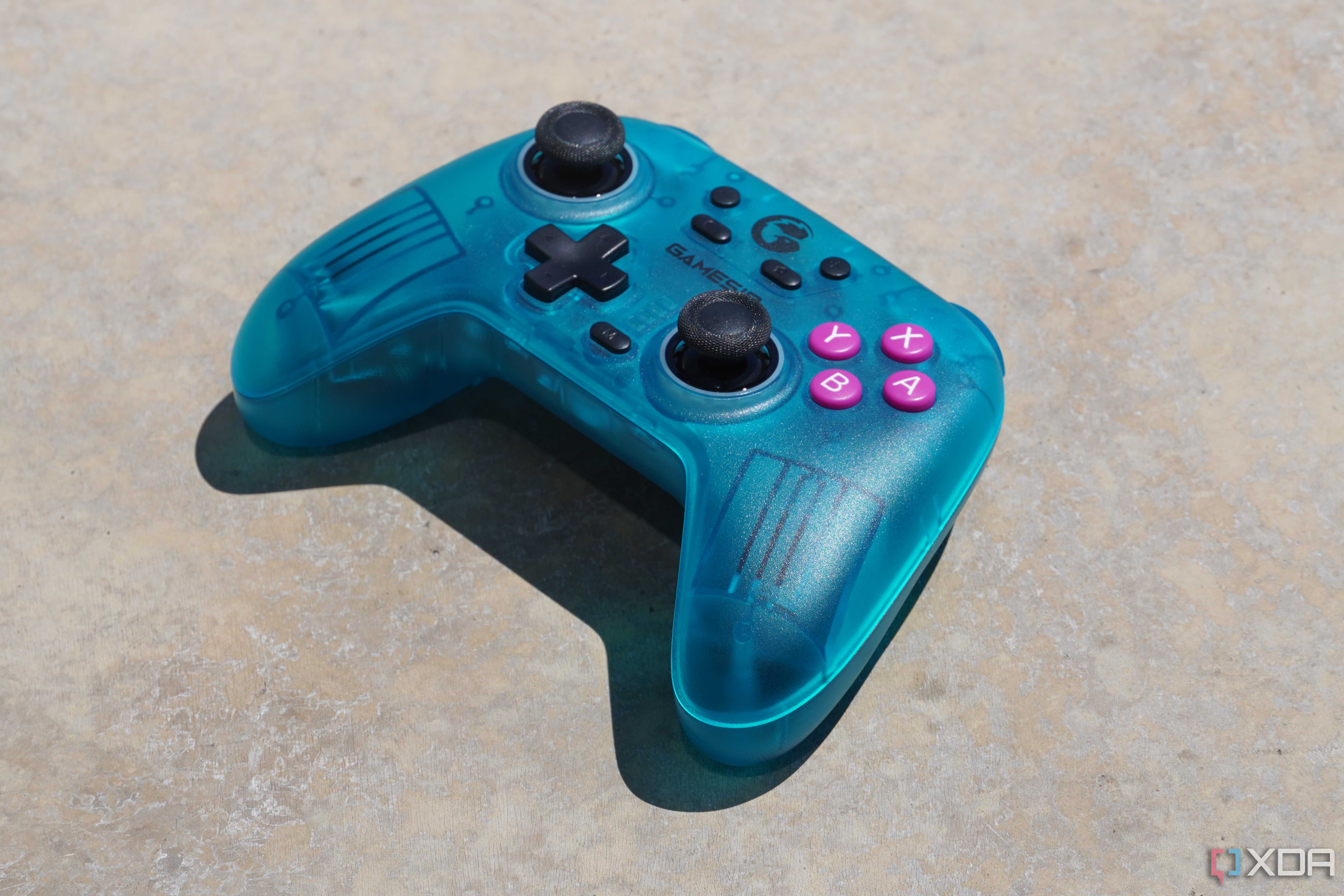 An angled view of the GameSir Nova on concrete.