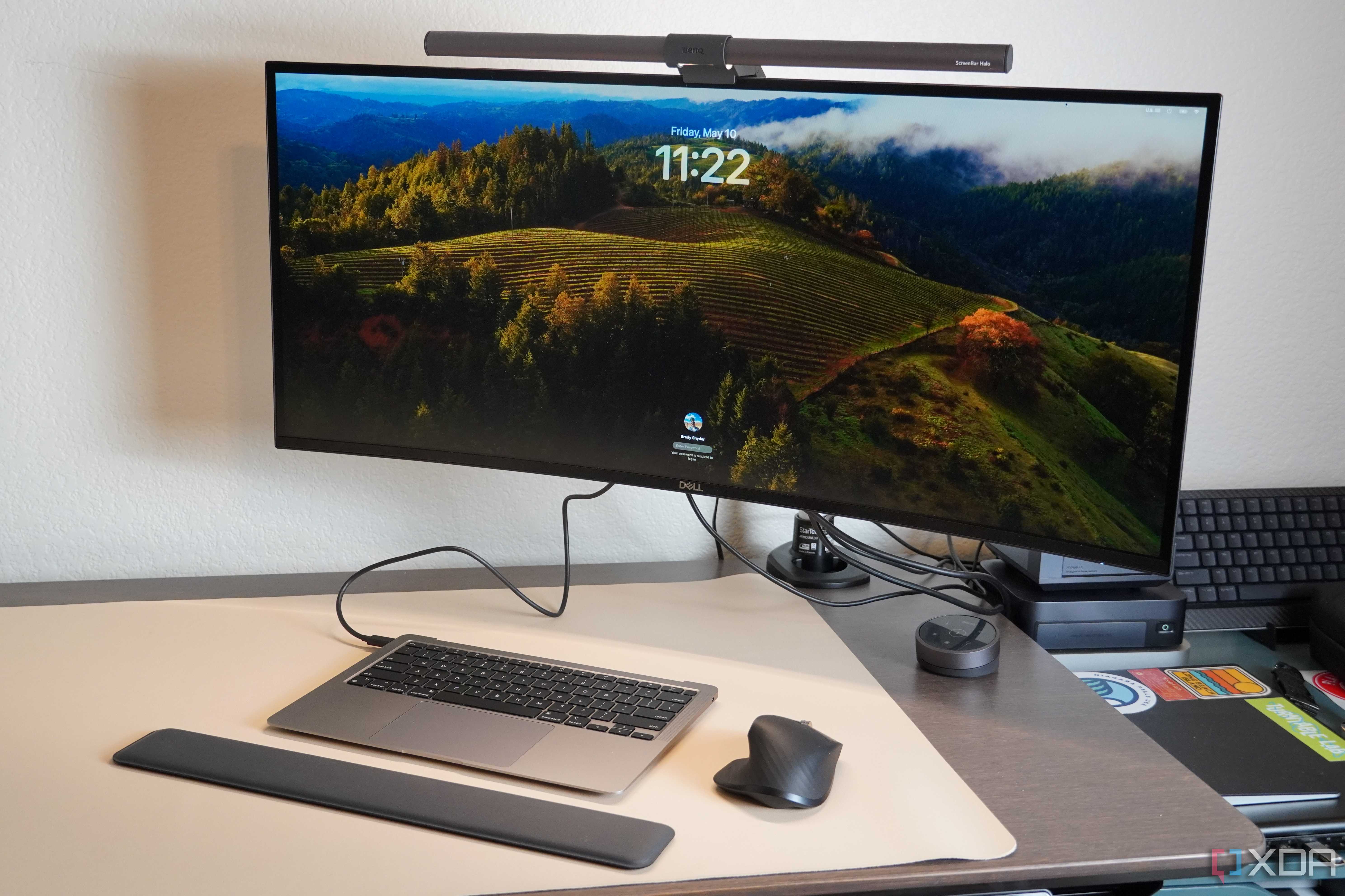 A desk setup featuring a headless MacBook Air.