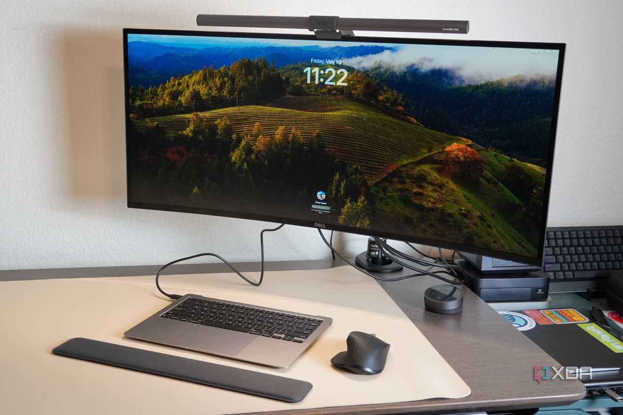 A desk setup featuring a headless MacBook Air.
