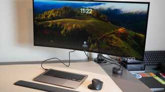 A desk setup featuring a headless MacBook Air.