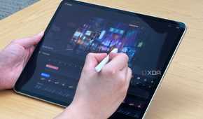 A person using the Apple Pencil Pro on the iPad Pro to edit video