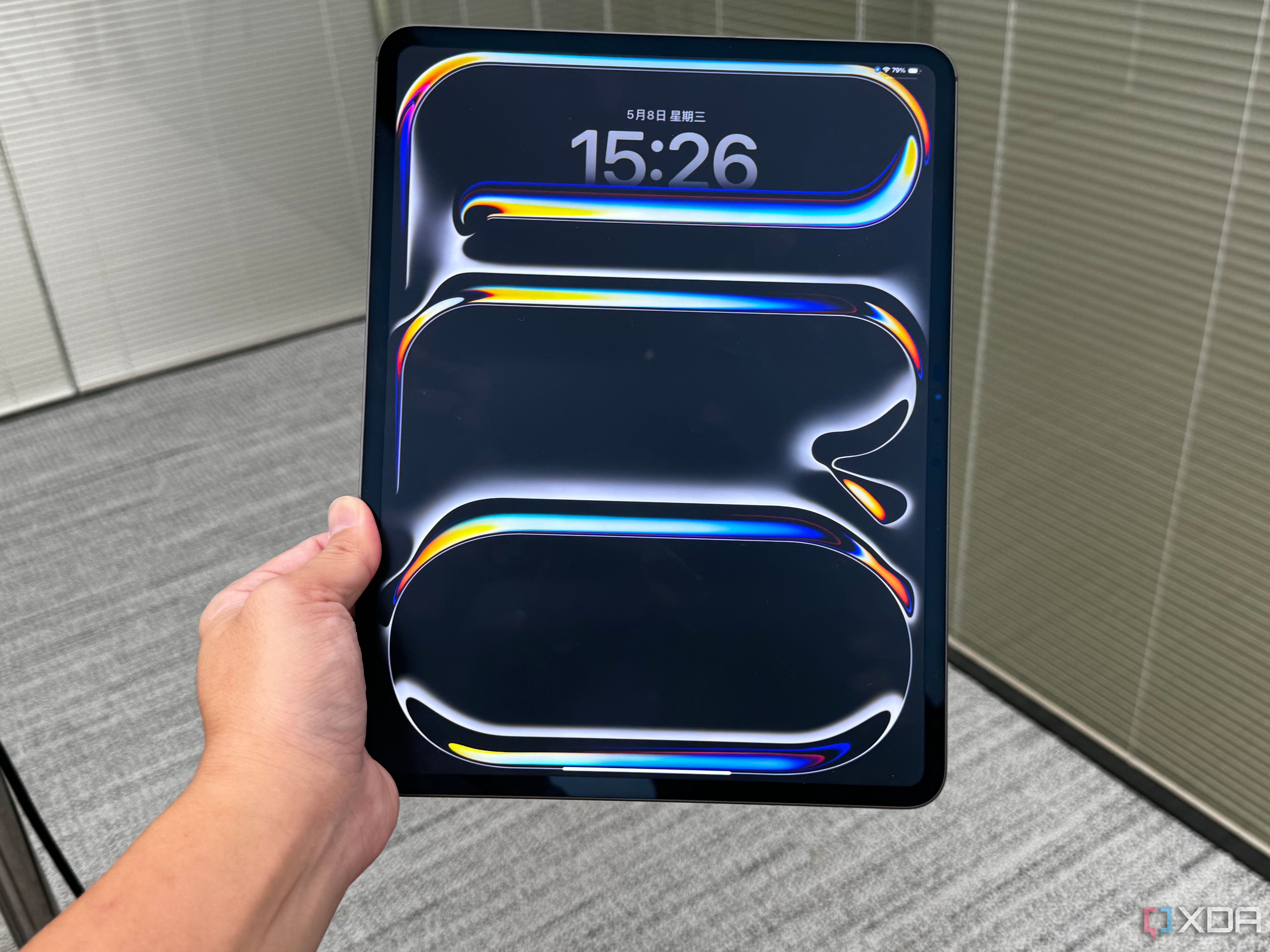 Front view of the 2024 iPad Pro in someone's hand