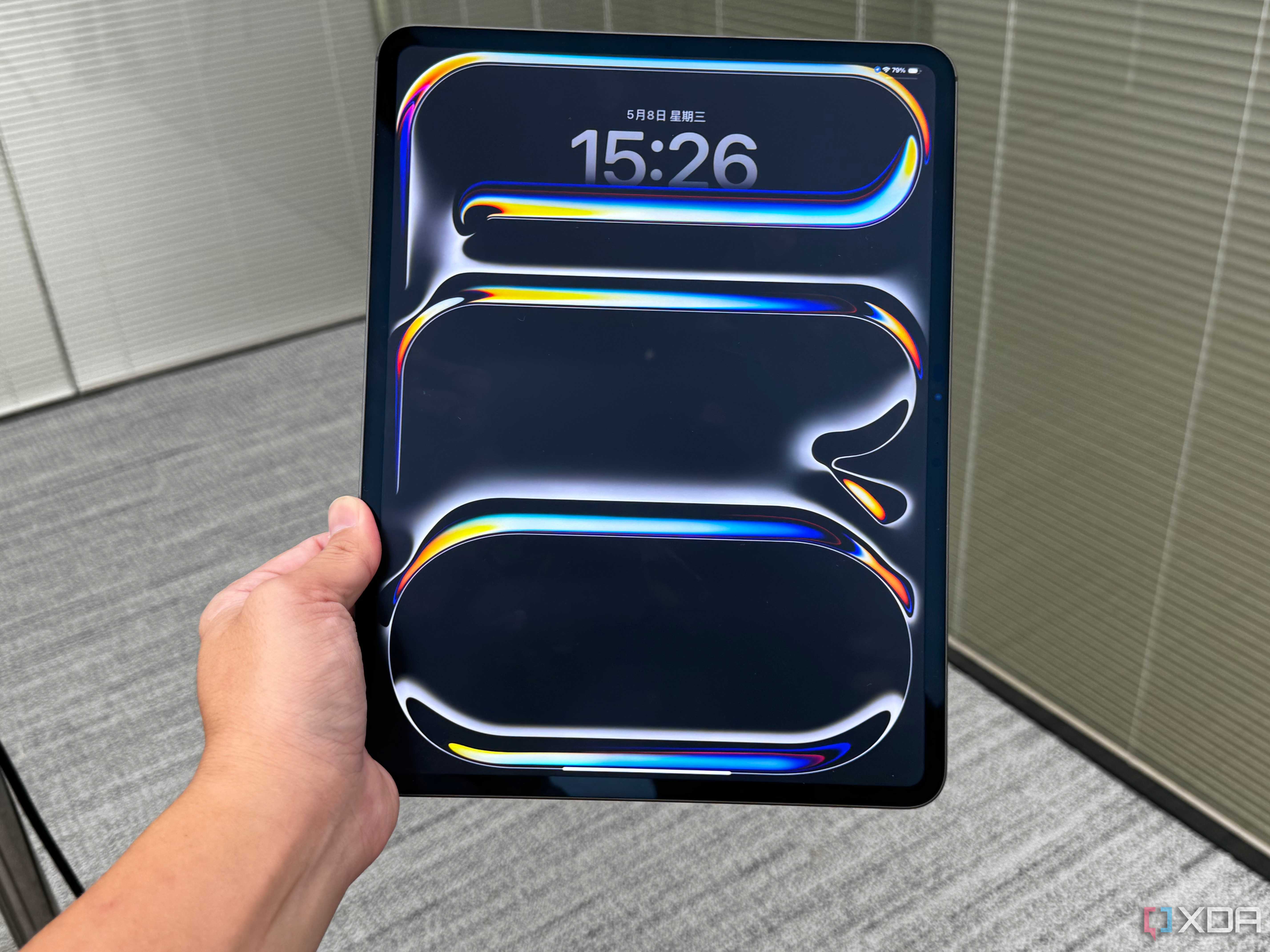 Front view of the 2024 iPad Pro in someone's hand