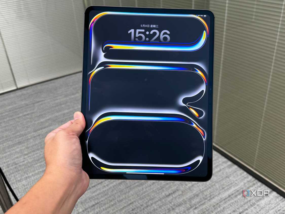 Front view of the 2024 iPad Pro in someone's hand