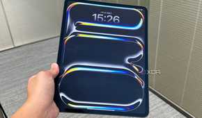 A 2024 iPad Pro held in a person's hand