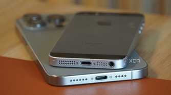 Two iPhones on a desk.