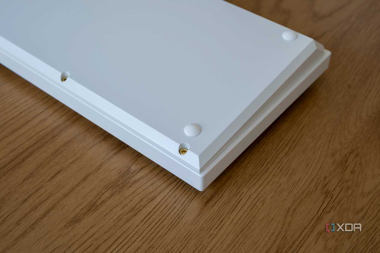 Underside of the Keychron Q1 HE showing hex key screws
