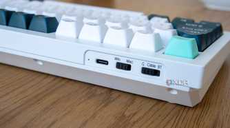 Close-up of the OS and mode switches on the Keychron Q1 HE