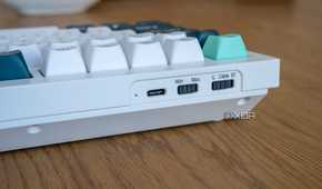 Close-up of the OS and mode switches on the Keychron Q1 HE