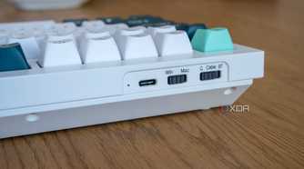 Close-up of the OS and mode switches on the Keychron Q1 HE