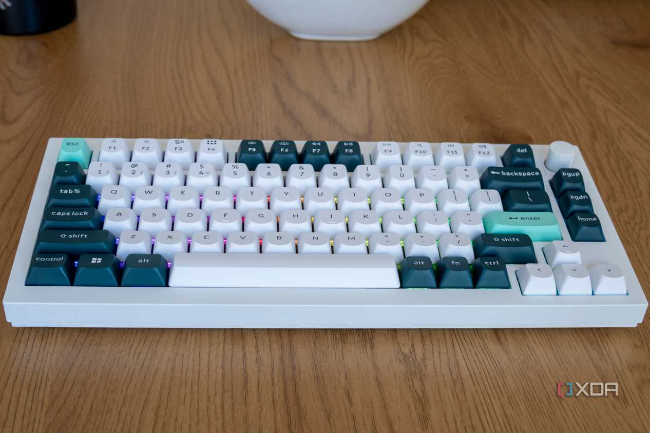 Angled view of the Keychron Q1 HE with some barely visible RGB lighting