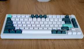 Angled view of the Keychron Q1 HE with some barely visible RGB lighting