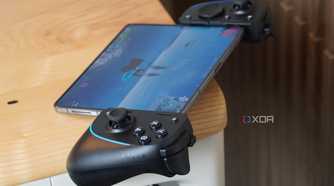 The Razer Kishi Ultra on a desk connected to a foldable.