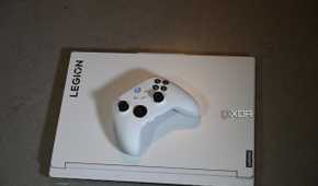 Top shot of Lenovo Legion 7i 16 9th Gen with white Xbox Series X controller