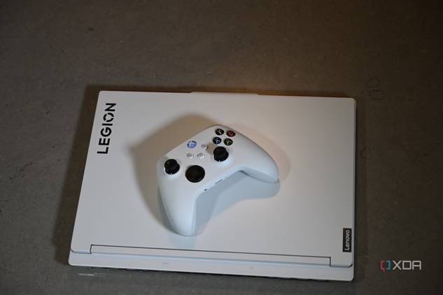 Top shot of Lenovo Legion 7i 16 9th Gen with white Xbox Series X controller