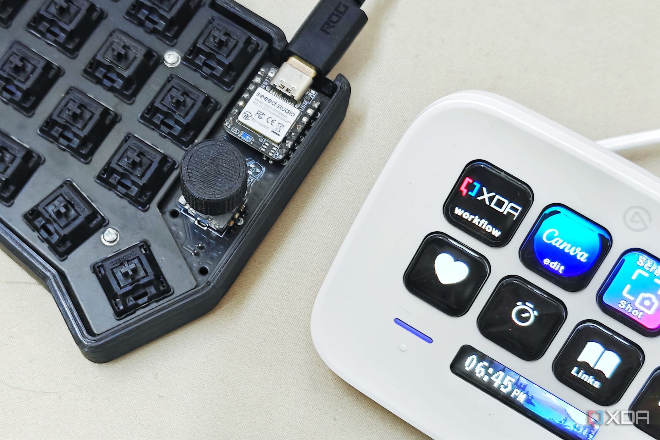 An image showing a macro pad sitting next to an Elgato Stream Deck Neo.